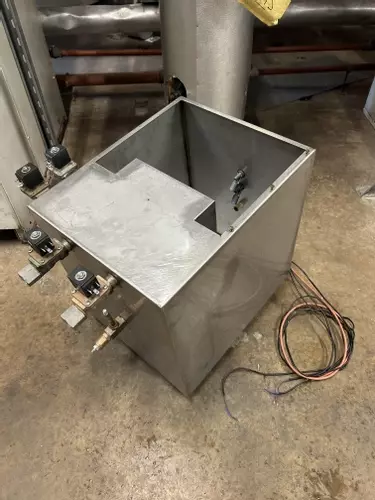 Custom-built stainless steel replacement tank assembled and ready for installation on a Nilfisk Delta Booster multi-pump pressure washer system.